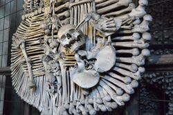 Bone sculpture in the catacombs of Teurek.jpg